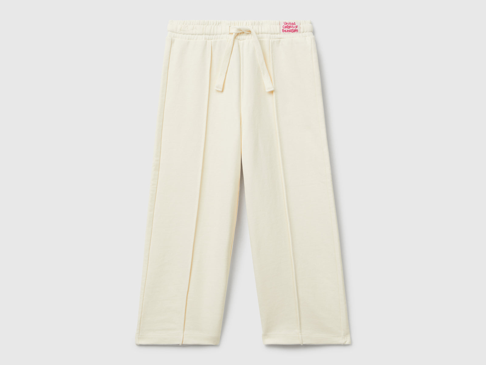 Pantaloni in felpa wide fit da bimba bianco panna | Benetton Outlet