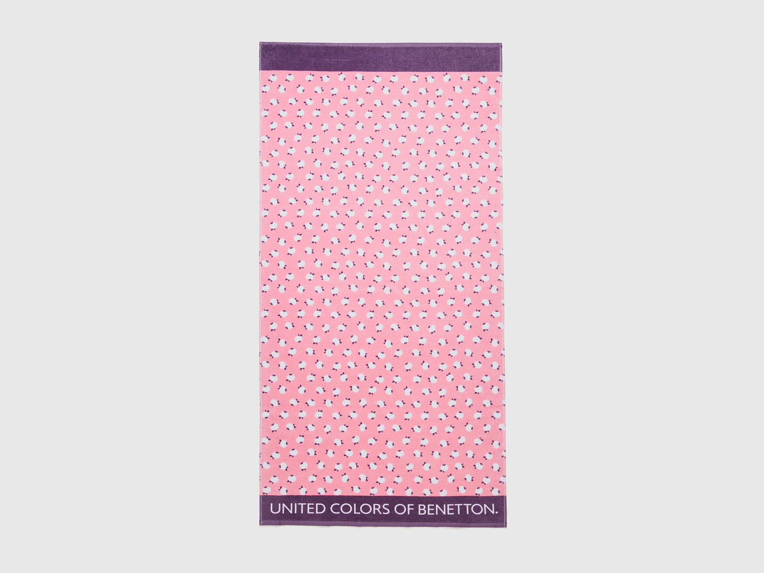 Telo mare con pattern mirtilli da bambino rosa | Benetton Outlet