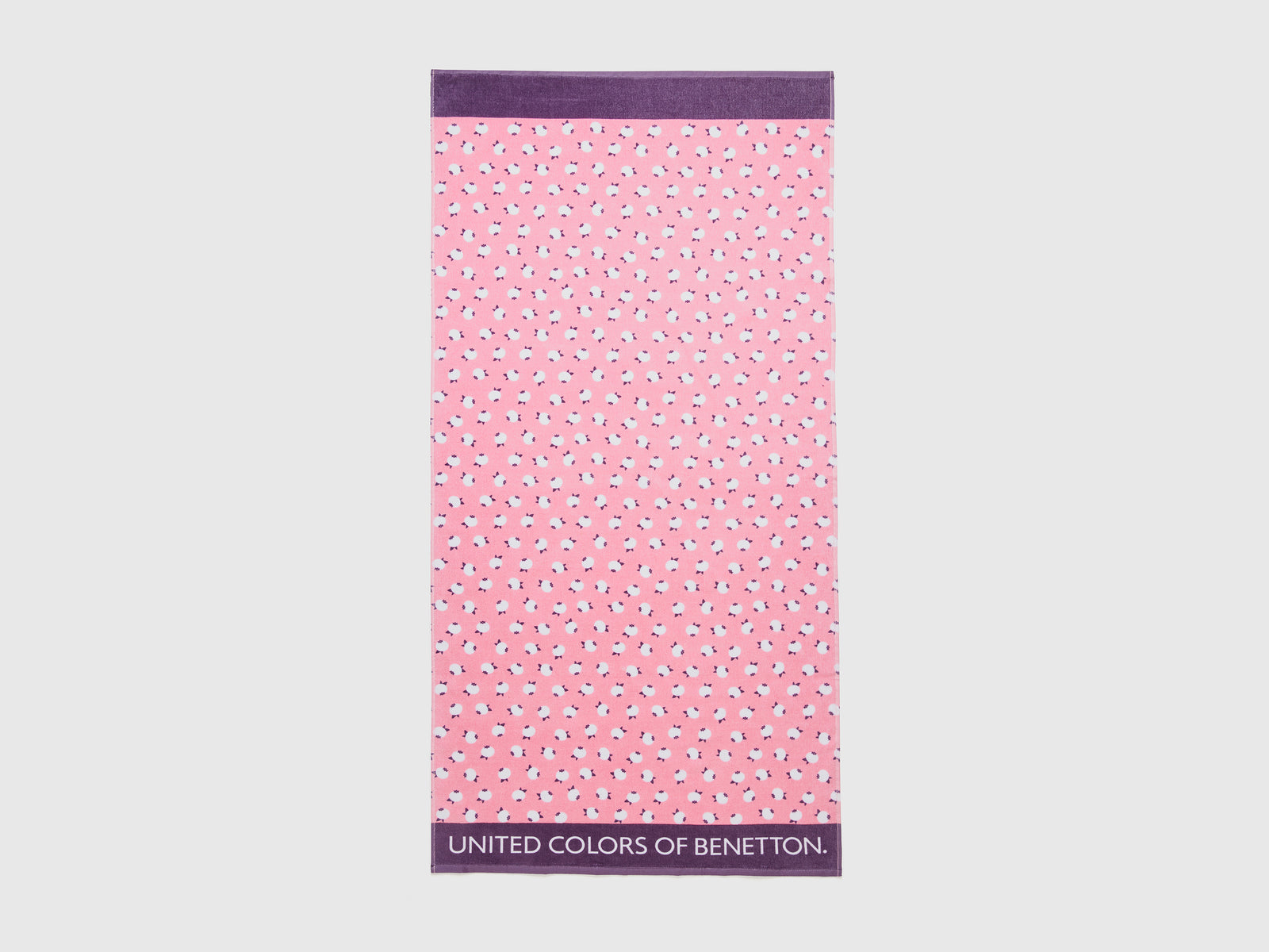 Telo mare con pattern mirtilli da bambino rosa | Benetton Outlet