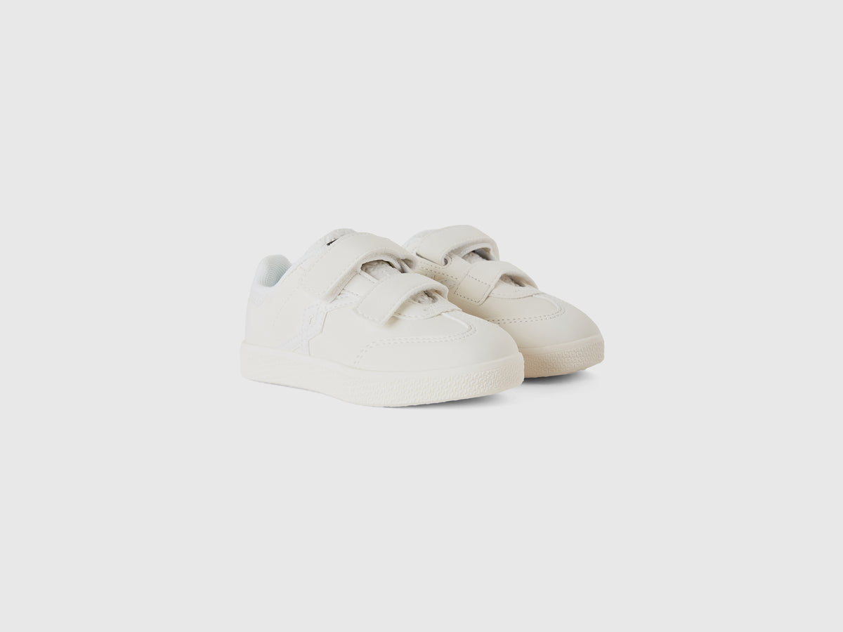 Sneakers in tessuto spalmato