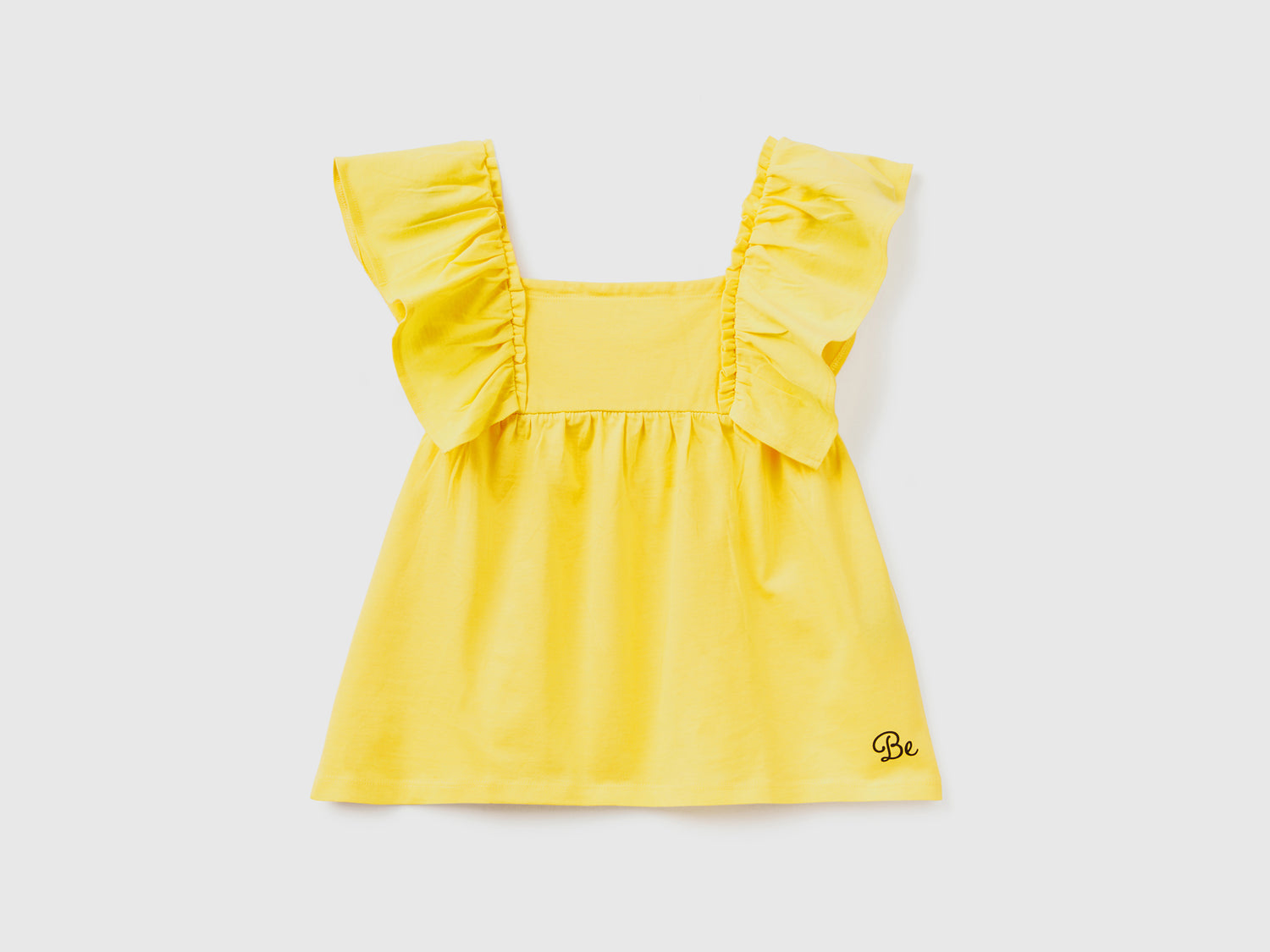 T-shirt in puro cotone dal taglio leggermente svasato da bambina giallo | Benetton Outlet