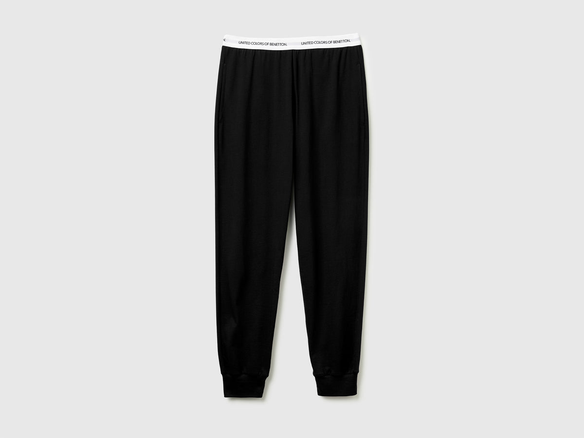 Pantaloni con elastico logato