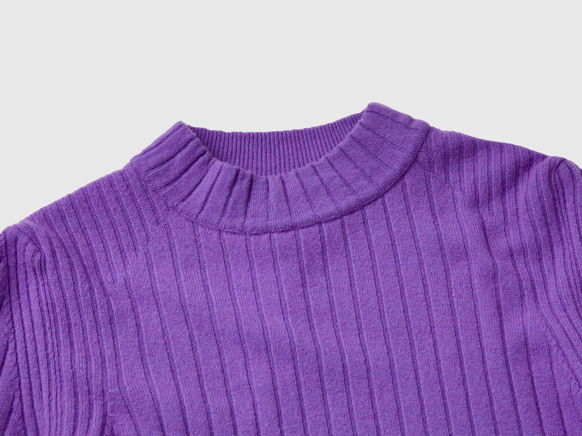 Maglia lupetto con spacchi