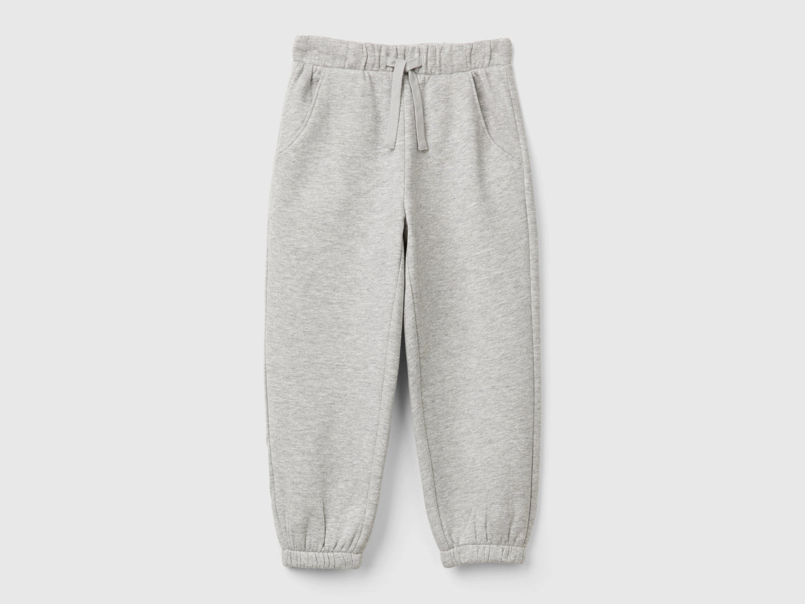 Joggers in felpa con coulisse da bimba grigio chiaro | Benetton Outlet
