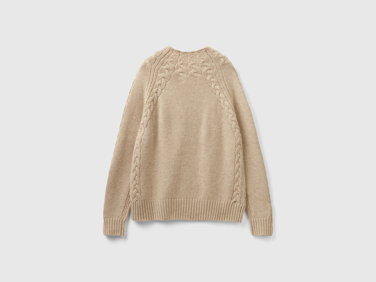 Maglione con trecce