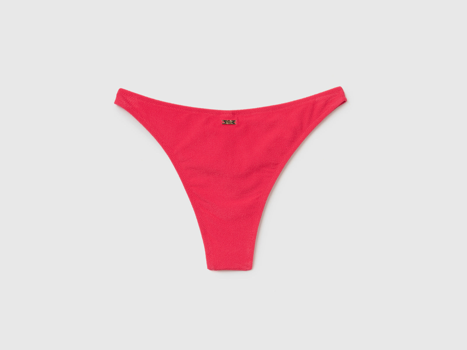 Slip costume con taglio a V in tessuto elasticizzato effetto spugna da donna fucsia 2 | Benetton Outlet