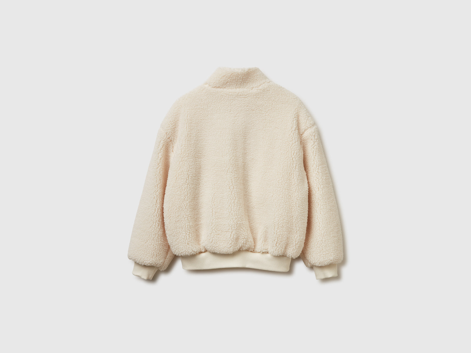 Felpa con collo alto in pelliccetta sintetica da bambina bianco panna 2 | Benetton Outlet