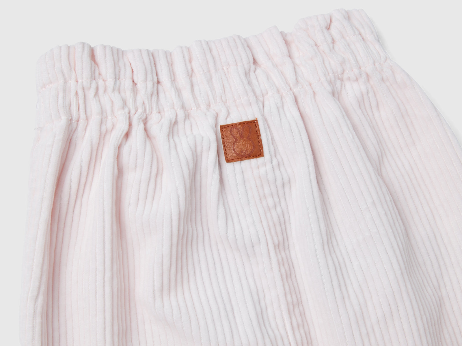 Pantaloni paperbag in velluto a coste da neonato rosa tenue 2 | Benetton Outlet