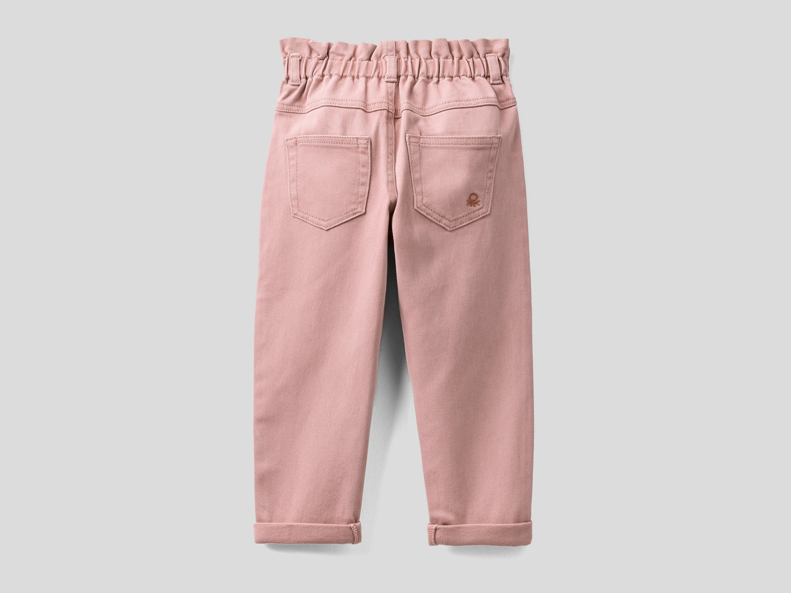 Pantaloni paperbag in cotone da bimba rosa tenue 2 | Benetton Outlet