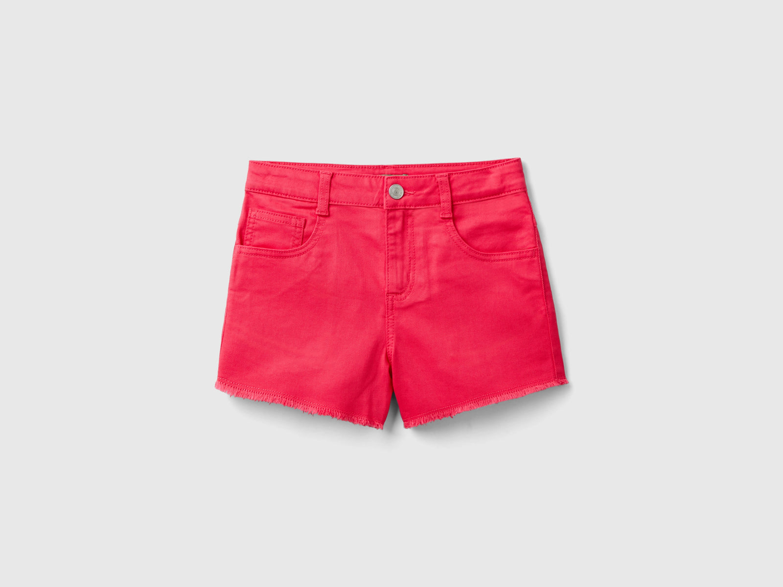 Shorts sfrangiati in cotone stretch da bambina fucsia | Benetton Outlet