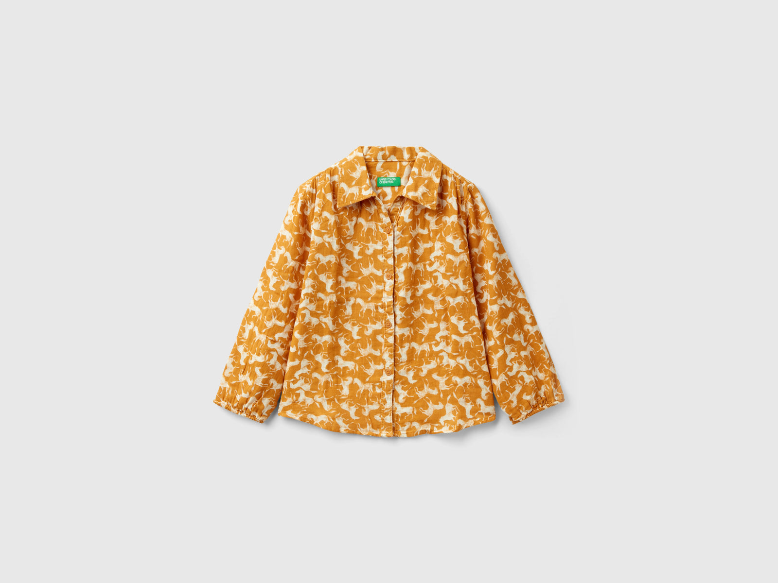 Camicia con stampa cavalli da bambina senape | Benetton Outlet