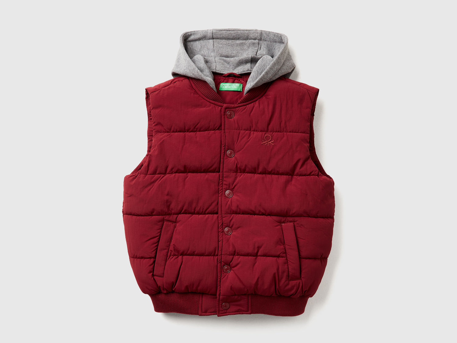 Gilet imbottito con cappuccio staccabile da bambino bordeaux | Benetton Outlet