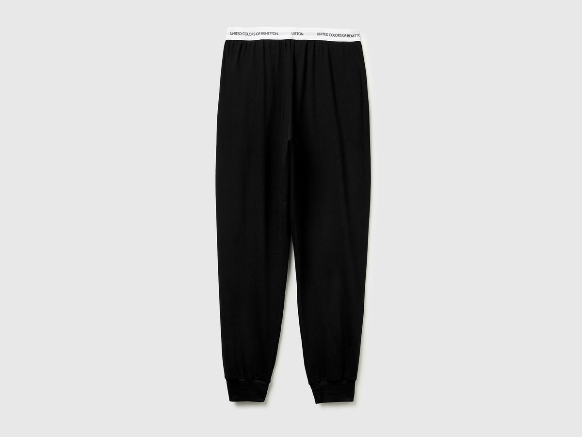 Pantaloni con elastico logato