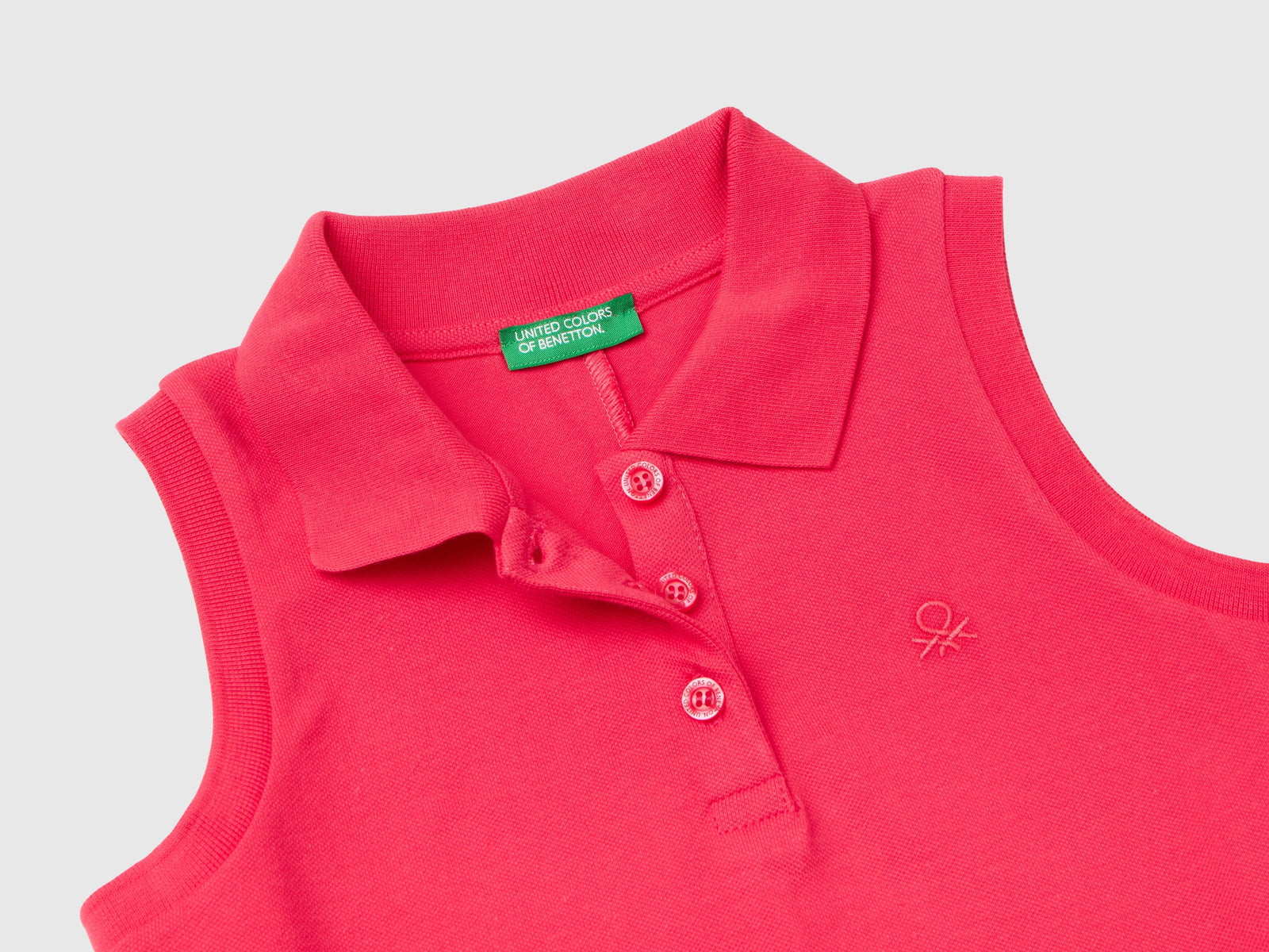 Vestito smanicato stile polo da bambina fucsia 2 | Benetton Outlet