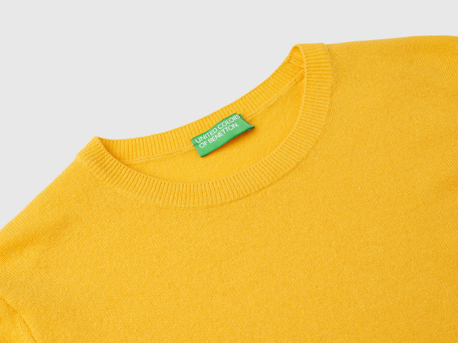 Maglia girocollo giallo ocra in pura lana Merino da donna senape 3 | Benetton Outlet