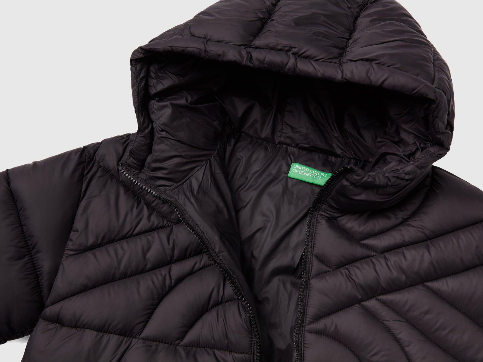 Piumino corto imbottito con ovatta riciclata da bambino nero 3 | Benetton Outlet