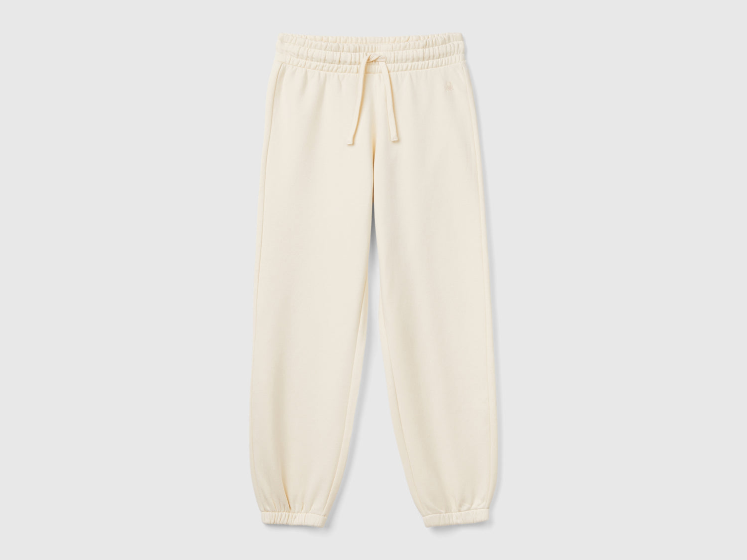 Joggers in felpa con coulisse da bambina bianco panna | Benetton Outlet