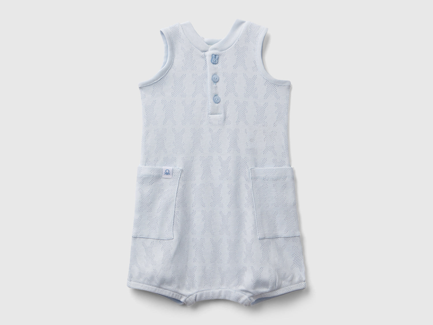 Tuta smanicata con taschini da neonato azzurro | Benetton Outlet