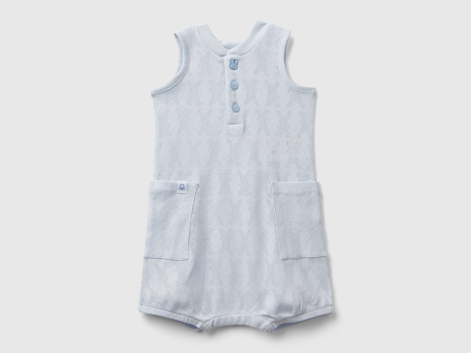 Tuta smanicata con taschini da neonato azzurro | Benetton Outlet