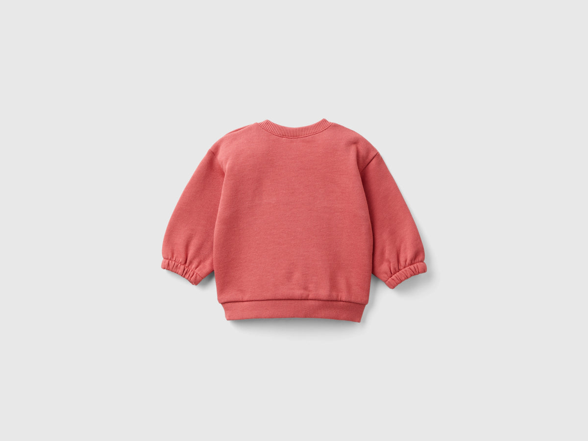 Felpa con ricamo e patch in cotone bio