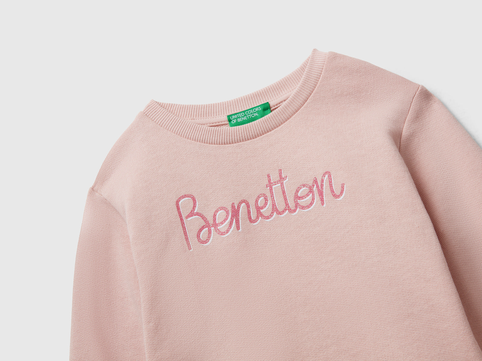 Felpa con stampa glitter da bimba rosa tenue 3 | Benetton Outlet