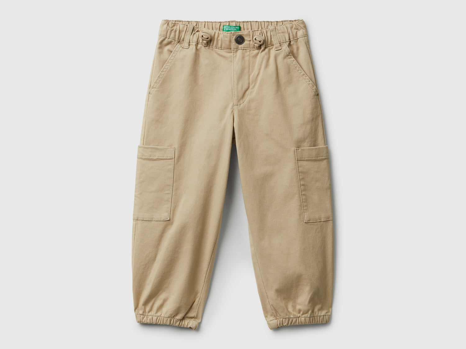 Pantaloni parachute in cotone stretch da bimbo beige | Benetton Outlet