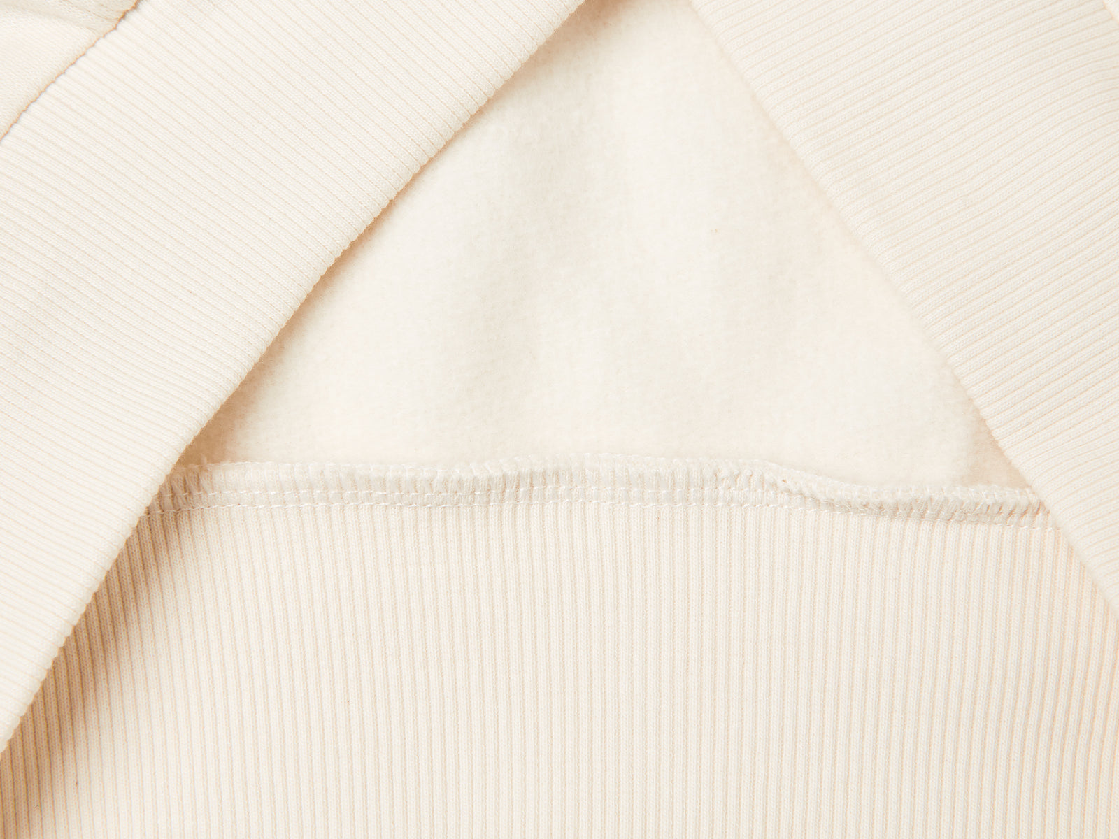 Felpa con zip e paillettes da bambina bianco panna 3 | Benetton Outlet