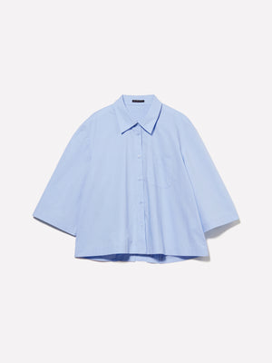 Camicia cropped azzurra con pieghe