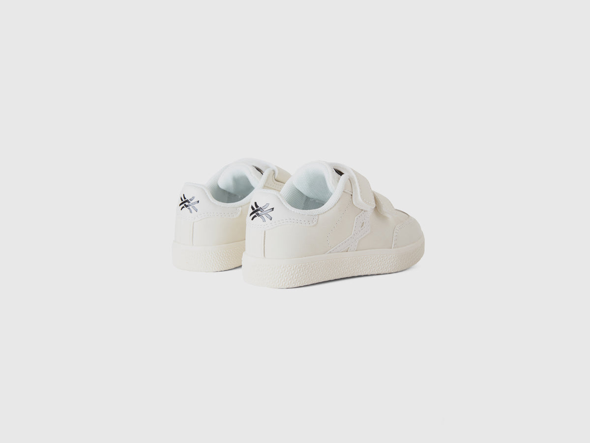Sneakers in tessuto spalmato
