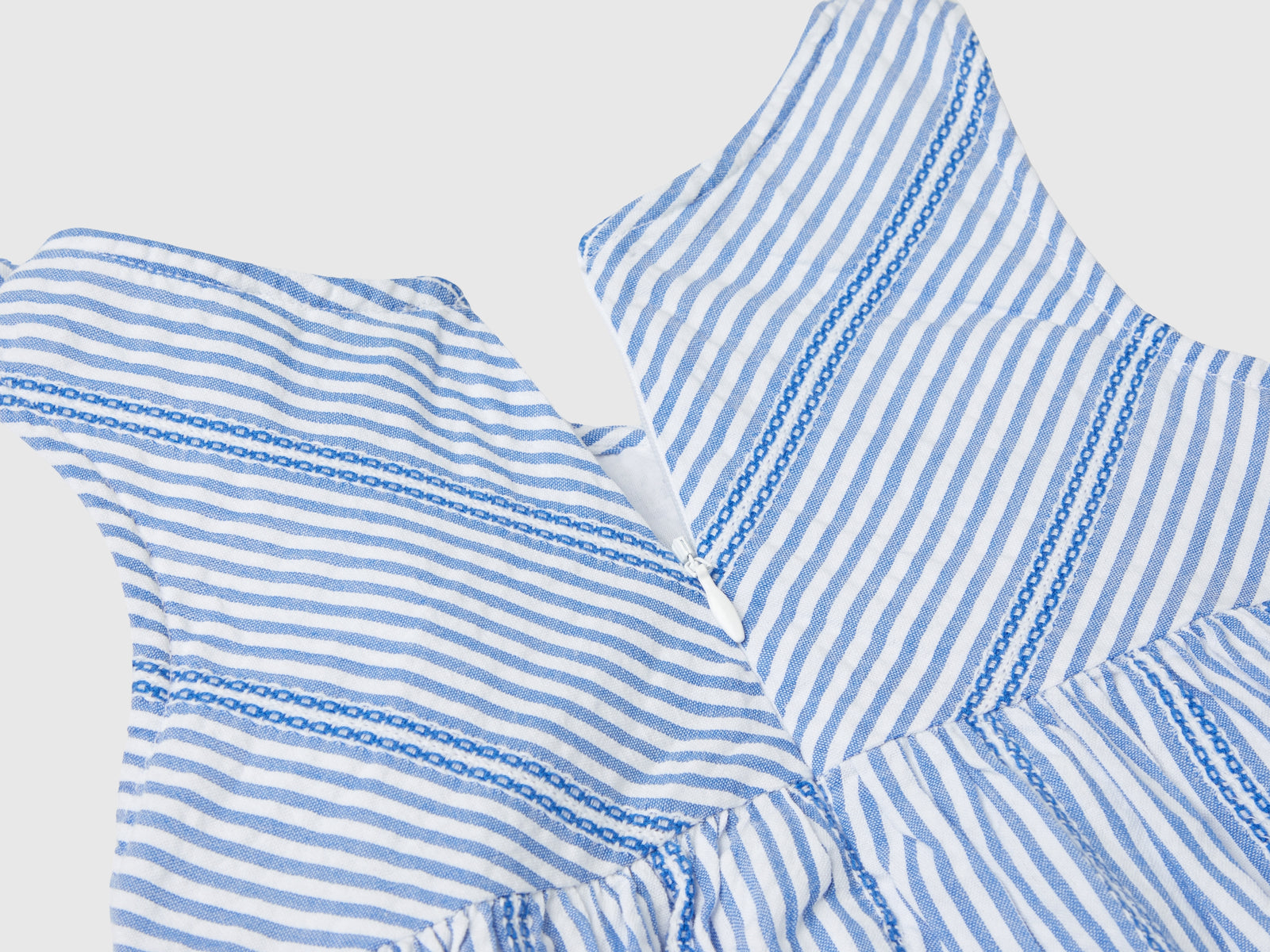 Vestito a righe in cotone leggero da bimba azzurro 2 | Benetton Outlet