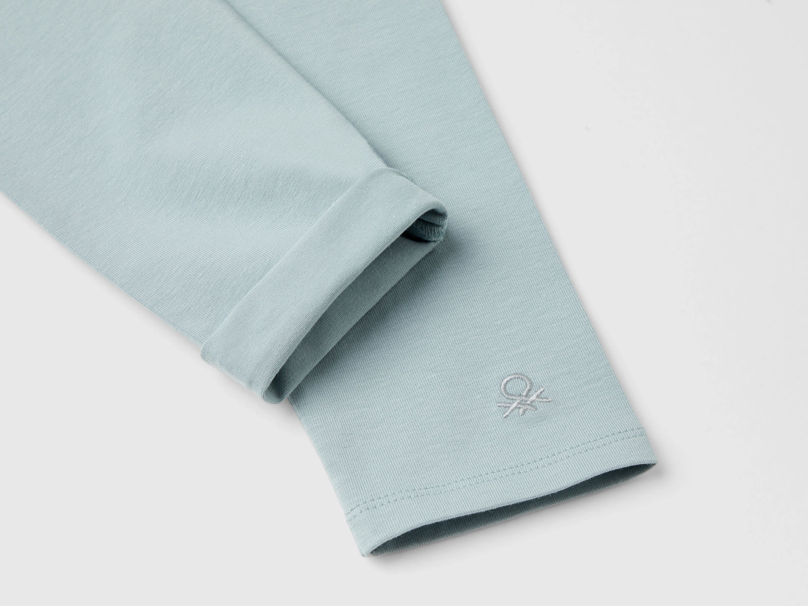 Leggings in cotone stretch con logo da bambina grigio perla 3 | Benetton Outlet