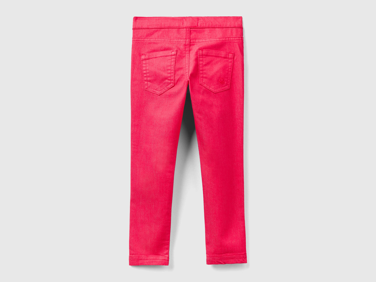 Jeggings in misto cotone stretch da bimba fucsia 2 | Benetton Outlet