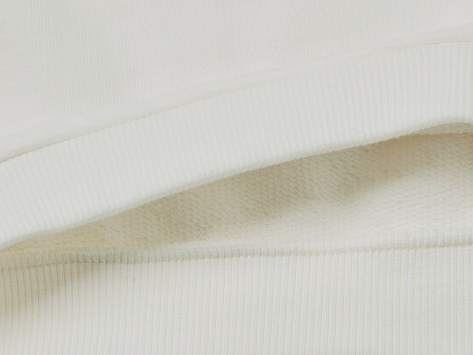 Felpa in cotone bio con stampa glitter da bimba bianco panna 2 | Benetton Outlet