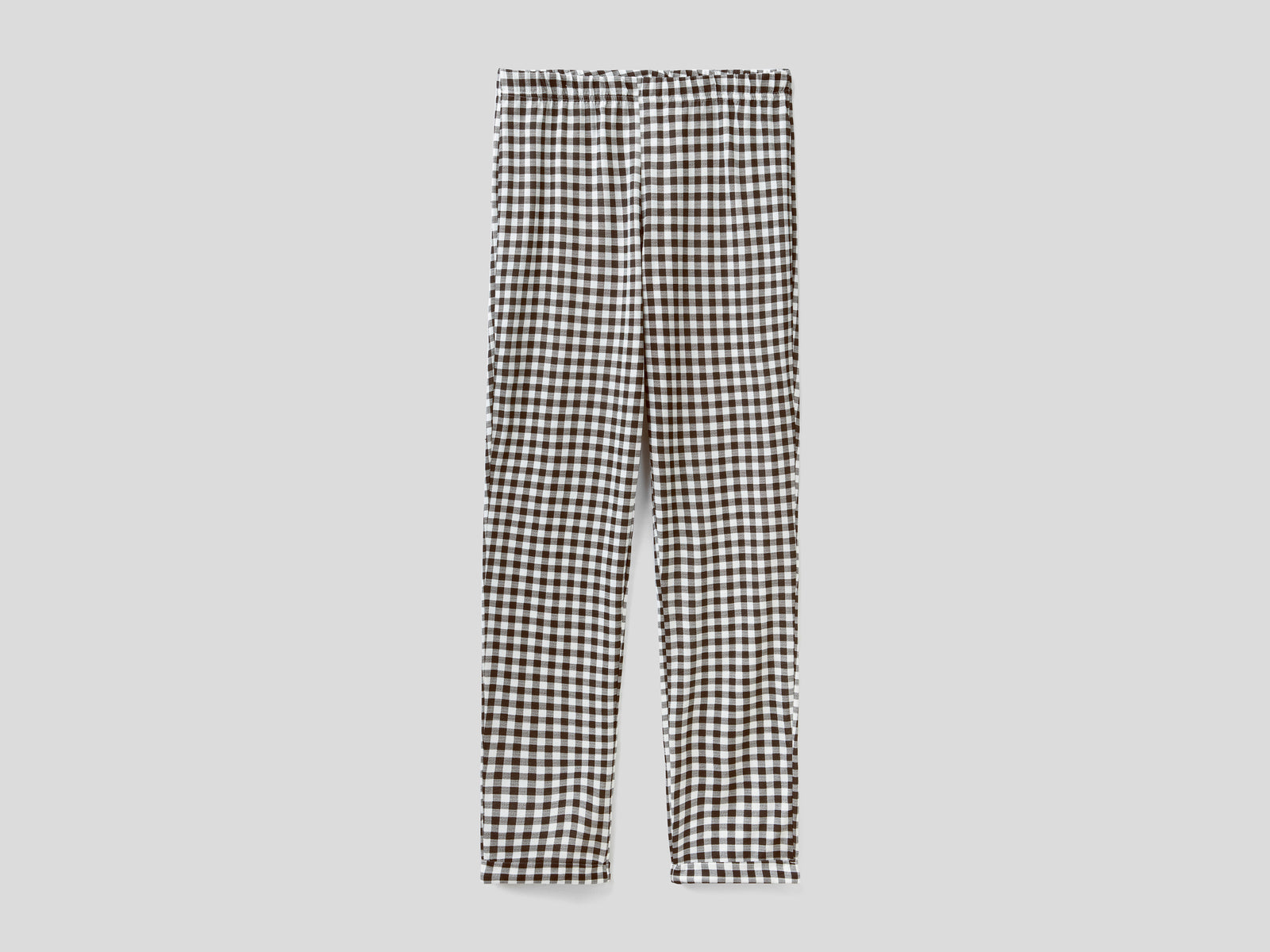 Pantaloni fluidi a quadri da donna nero | Benetton Outlet