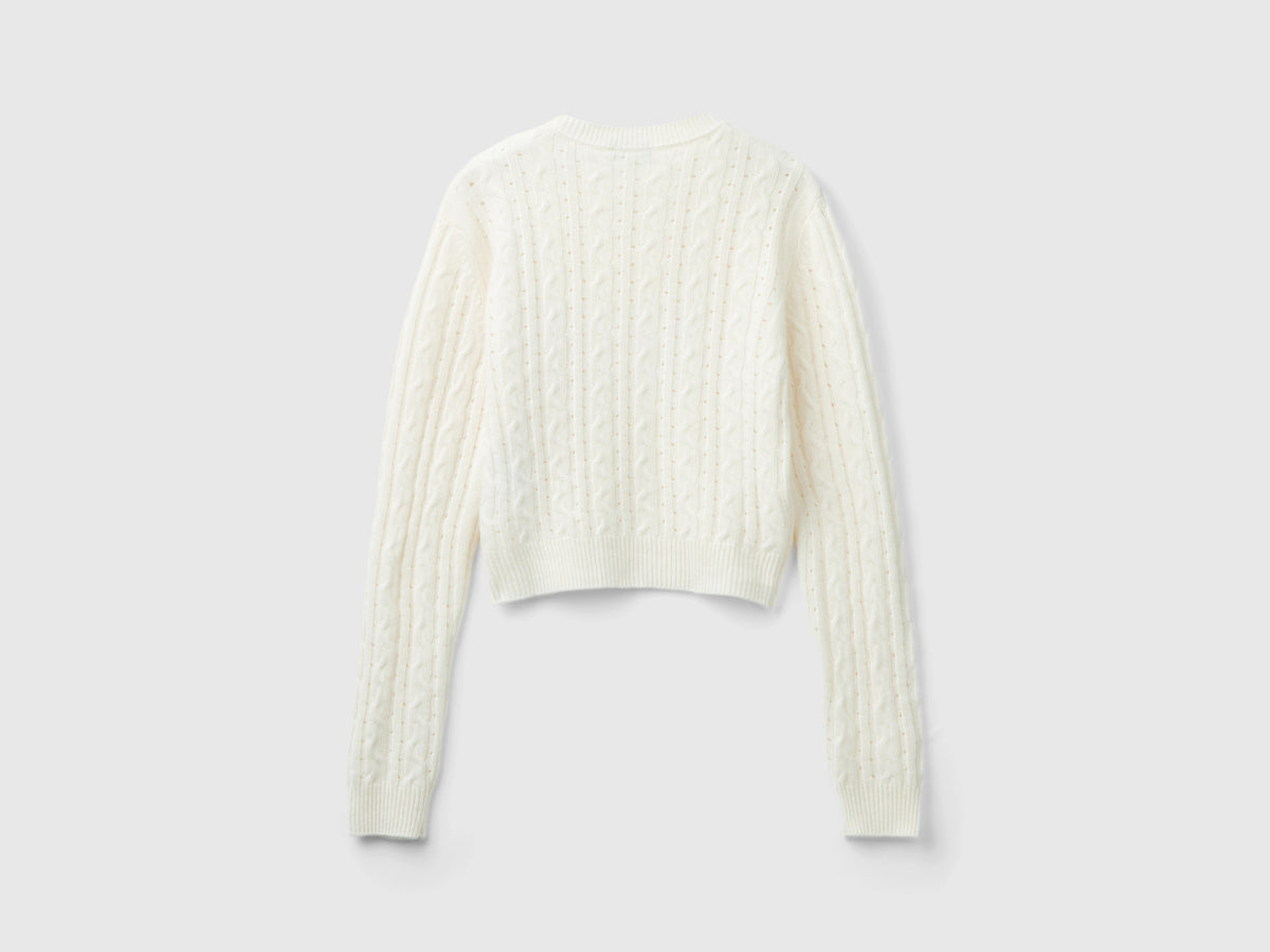 Maglia cropped con trecce e trafori