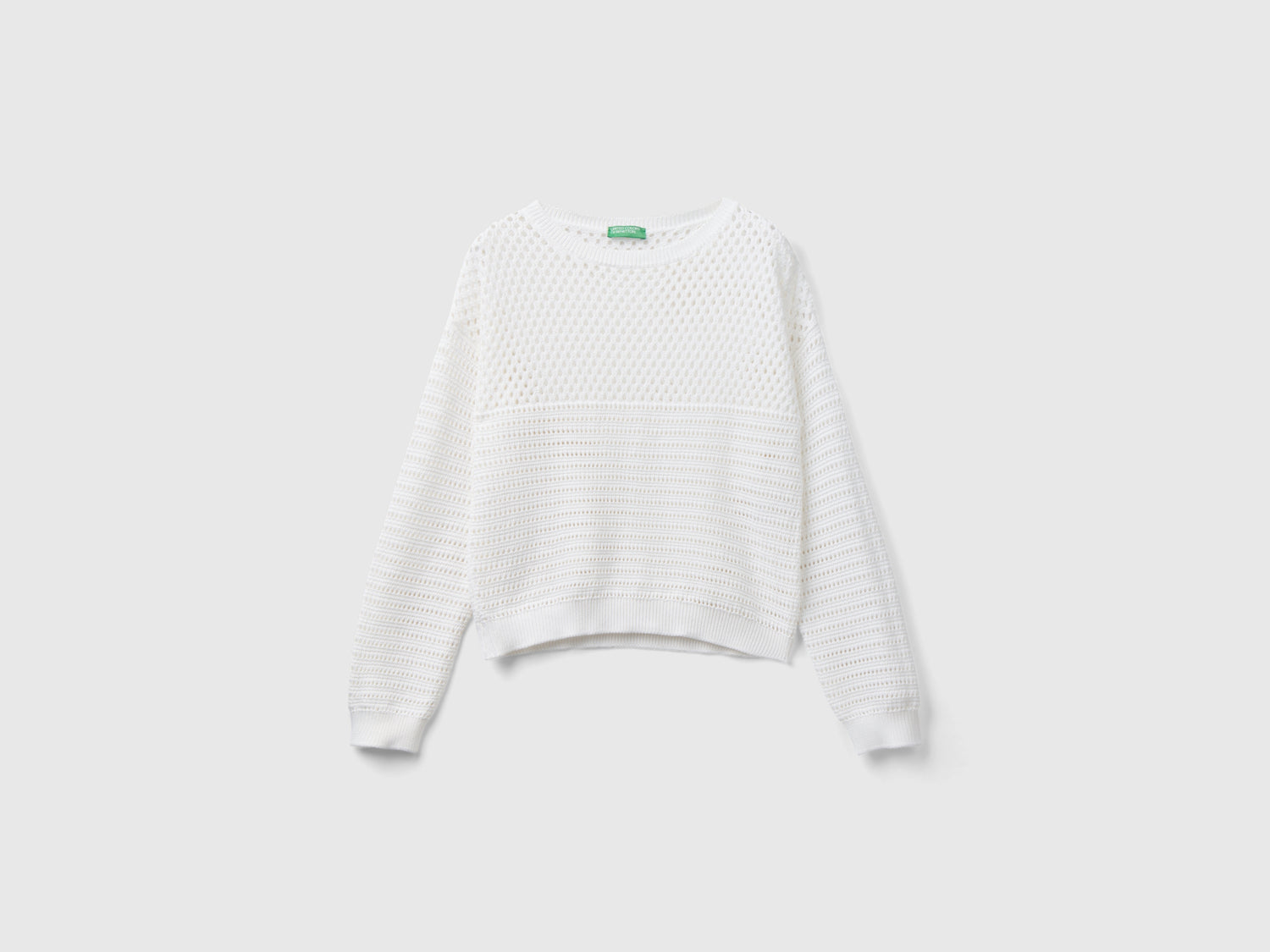 Maglia con trafori boxy fit da donna bianco | Benetton Outlet