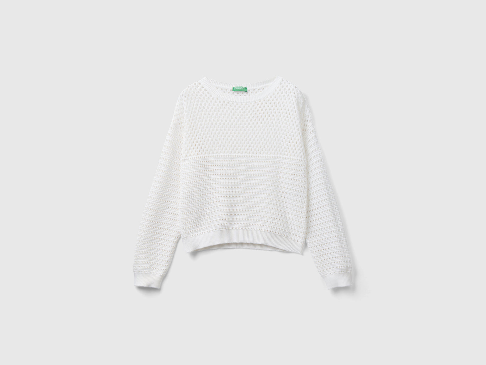 Maglia con trafori boxy fit da donna bianco | Benetton Outlet