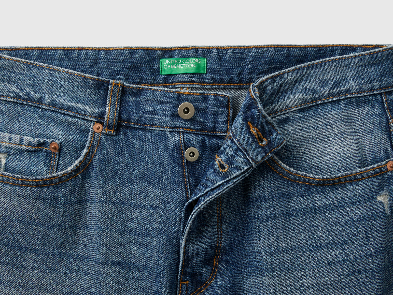 Jeans straight con rotture da uomo azzurro 3 | Benetton Outlet