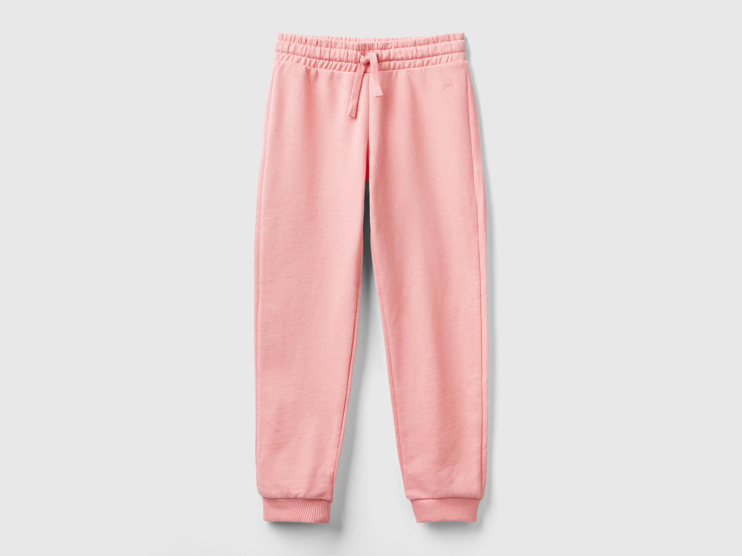 Pantaloni in felpa con logo da bambina rosa | Benetton Outlet