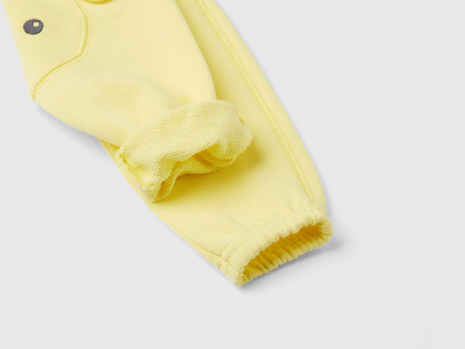 Pantaloni in felpa di cotone bio da neonato giallo 3 | Benetton Outlet