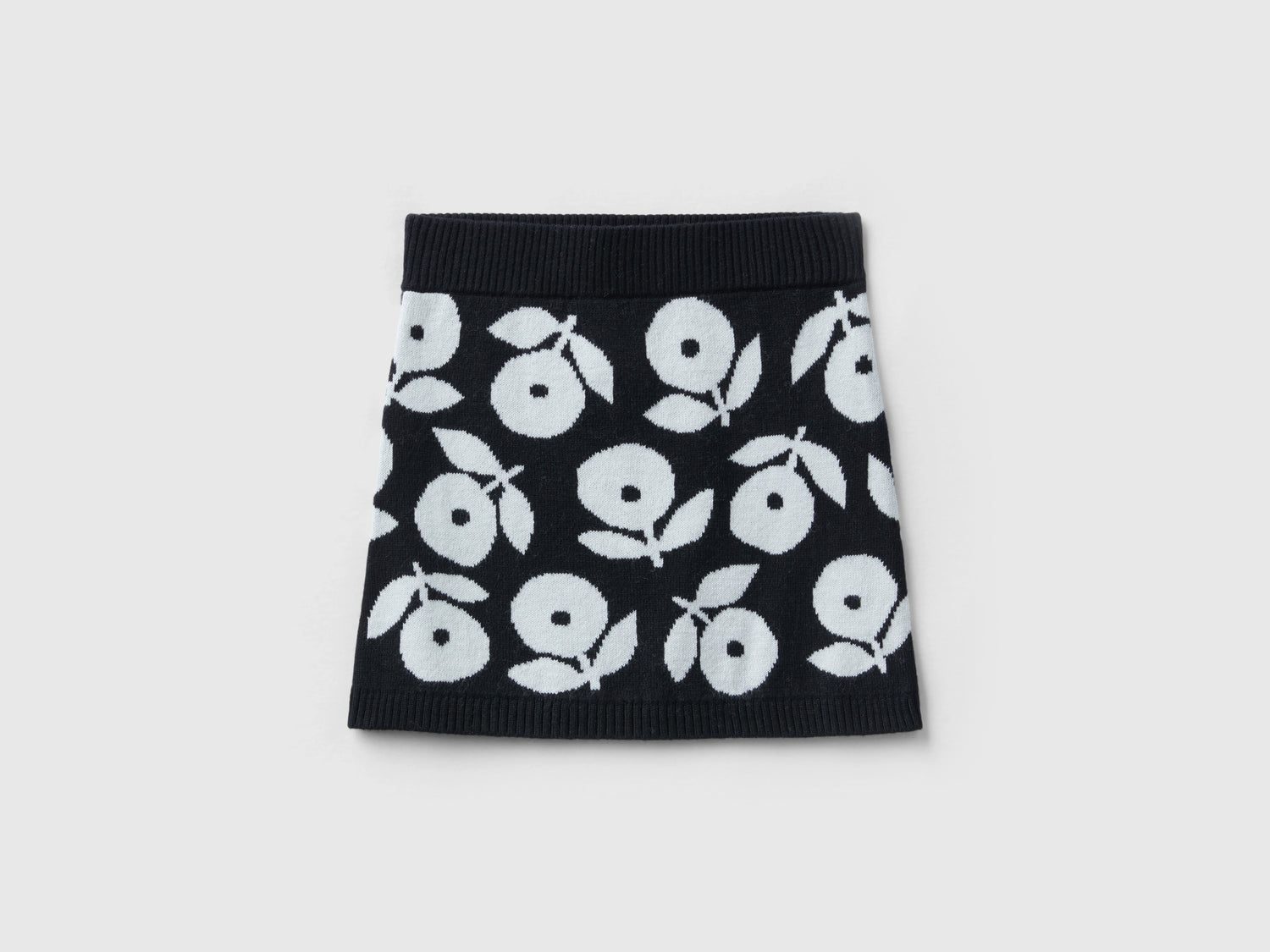 Minigonna a fiori in misto lana da bimba nero | Benetton Outlet