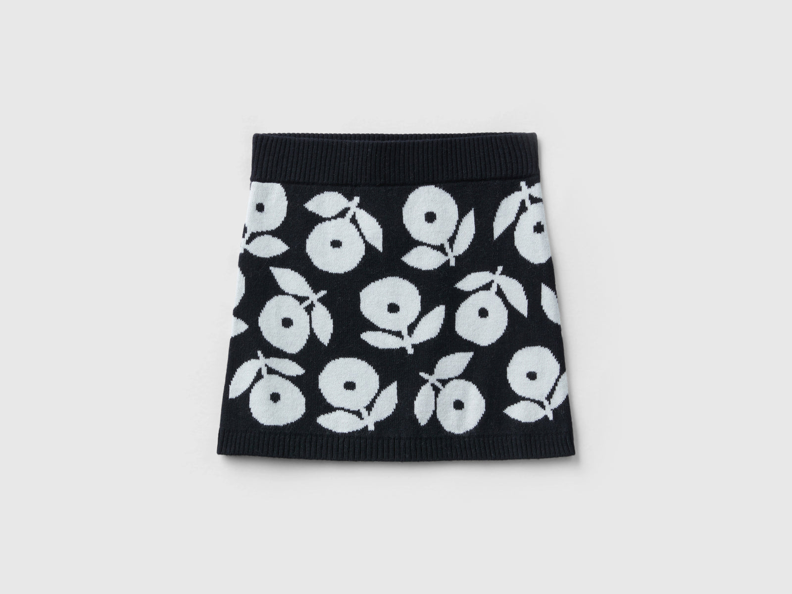 Minigonna a fiori in misto lana da bimba nero | Benetton Outlet