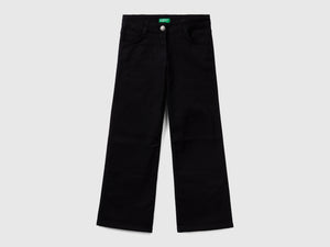 Pantaloni a zampa stretch