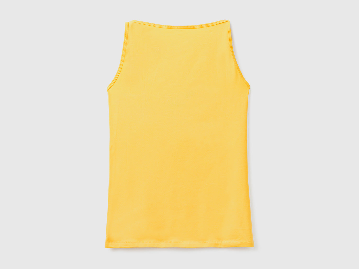 Top smanicato in cotone elasticizzato dalla vestibilità aderente da donna giallo | Benetton Outlet