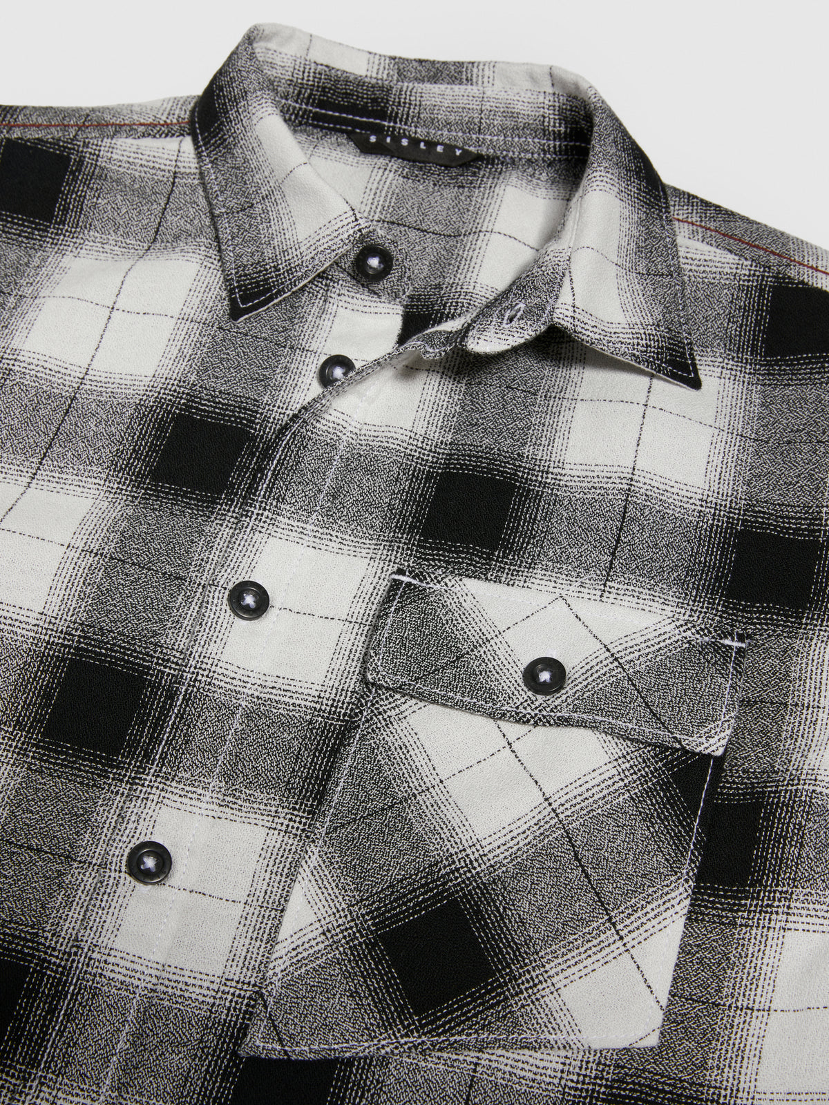 Camicia over a quadri