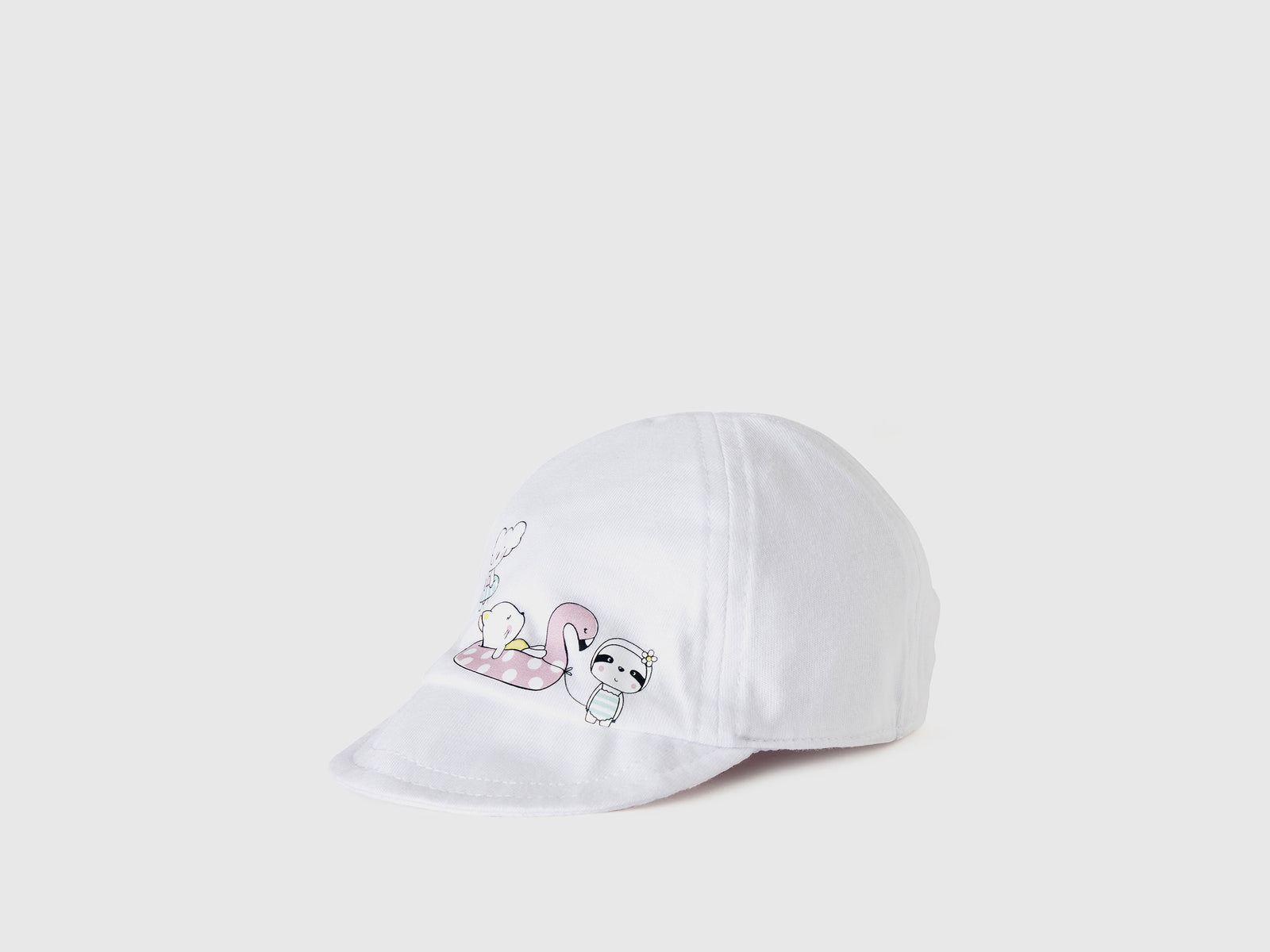 Cappellino con visiera modello baseball in puro cotone da neonato bianco | Benetton Outlet