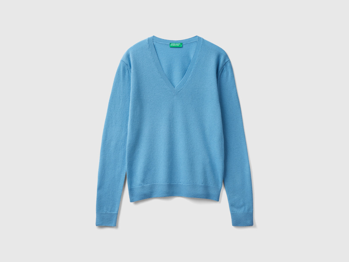Maglia con scollo a V azzurra in pura lana Merino