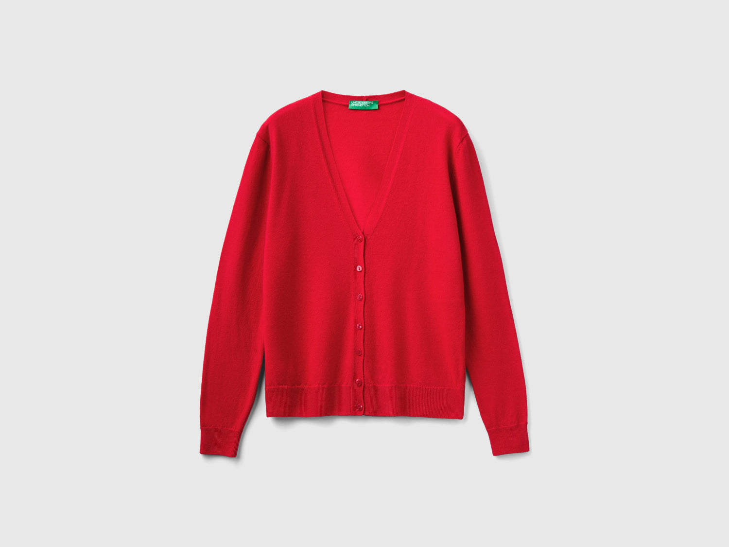 Cardigan scollo a V prugna in pura lana Merino da donna rosso | Benetton Outlet