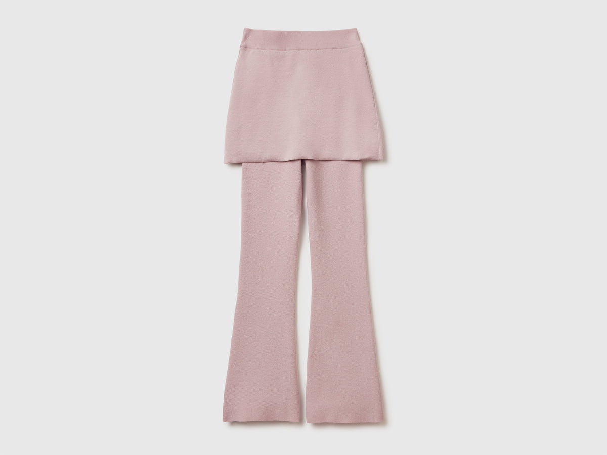 Pantaloni flare con minigonna