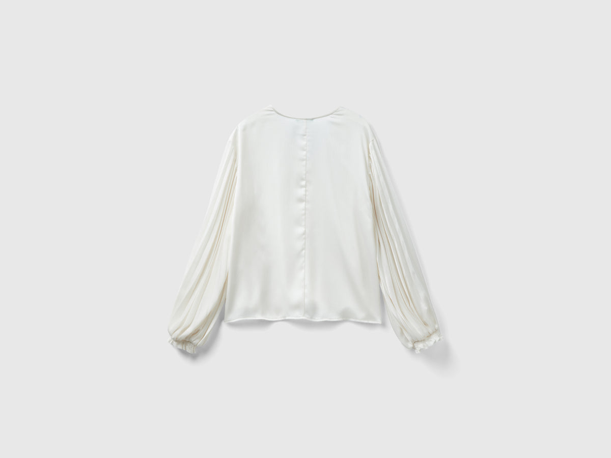 Blusa con manica lunga plissettata